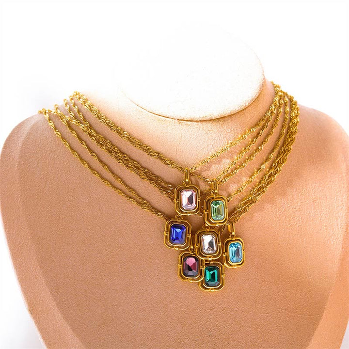 Collar de acero y titanio con circonitas cuadradas y cadena de ondas de agua de Olivenorma 