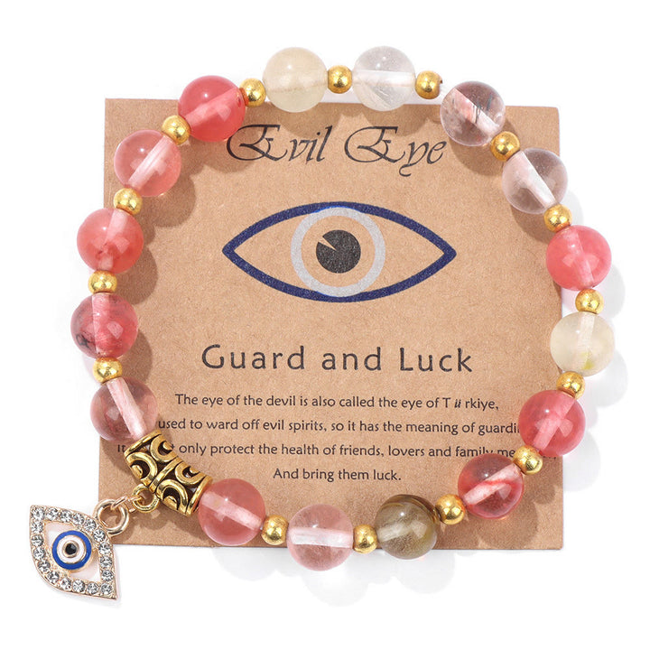 Pulsera con colgante de ojo malvado y cuentas de piedra natural de Olivenorma