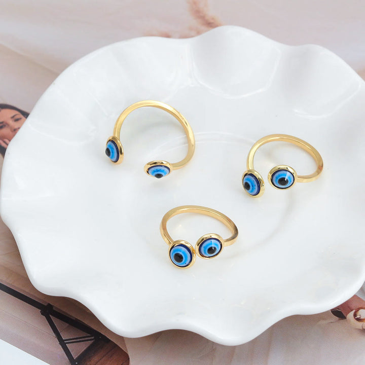 Anillo de mujer con ojo malvado bañado en oro y circonita blanca de Olivenorma 