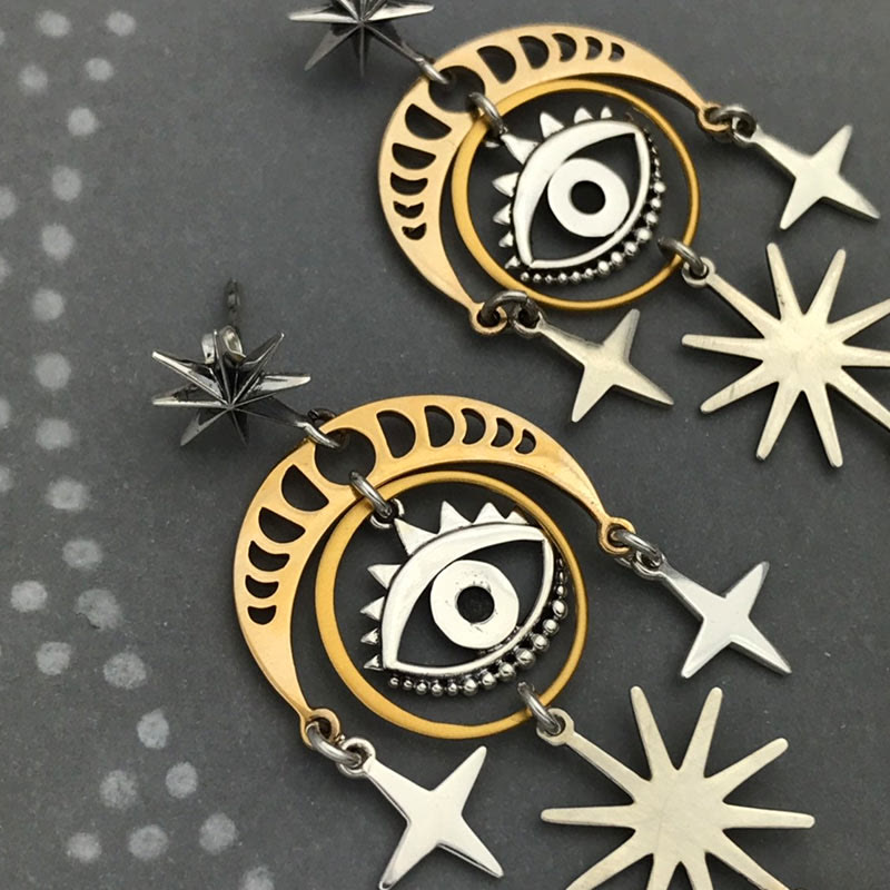 Pendientes de bruja con luna, estrella y ojo malvado de Olivenorma