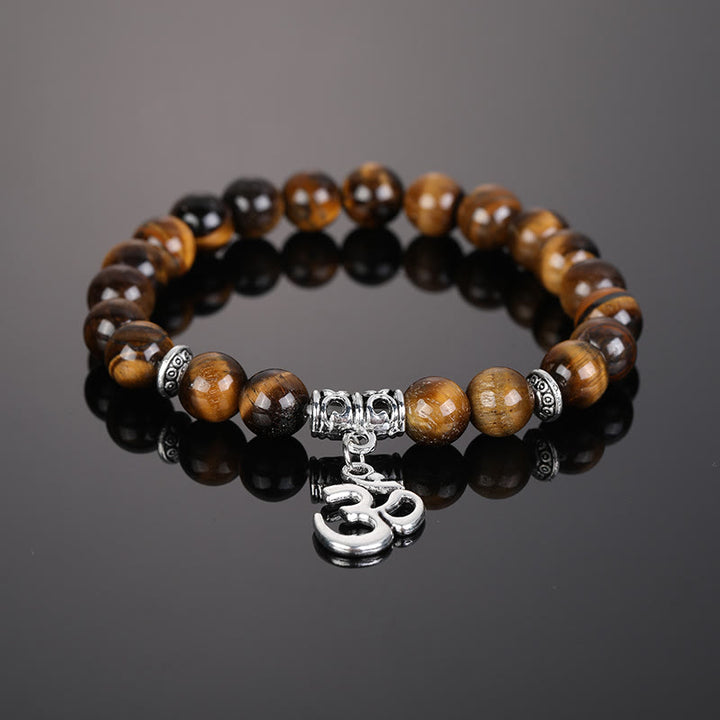 Pulsera con símbolo Om y cuentas de cristal natural de Olivenorma