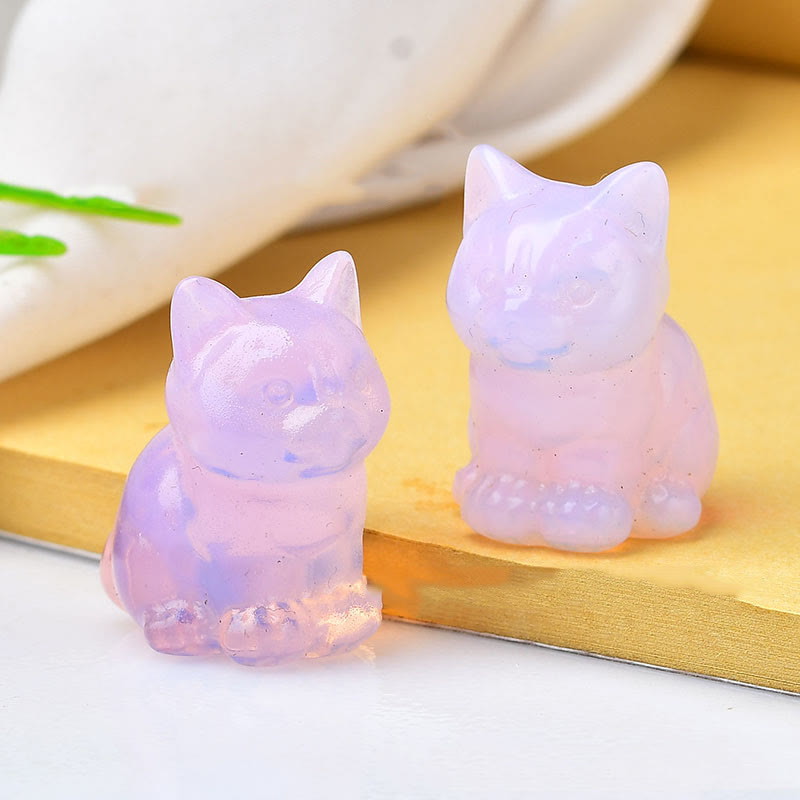 Artesanías con talladas de piedras preciosas y gatitos de cristal de Olivenorma.