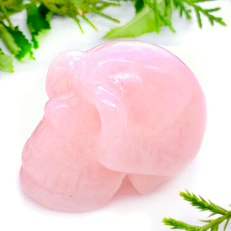 Decoración de calavera de cristal de cuarzo rosa