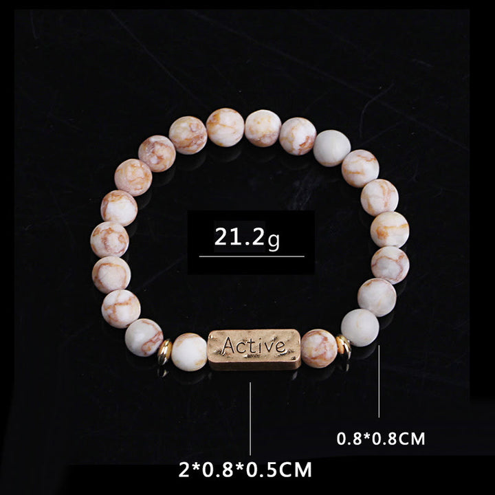 Pulsera con grabado de fe activa con piedras preciosas naturales de Olivenorma