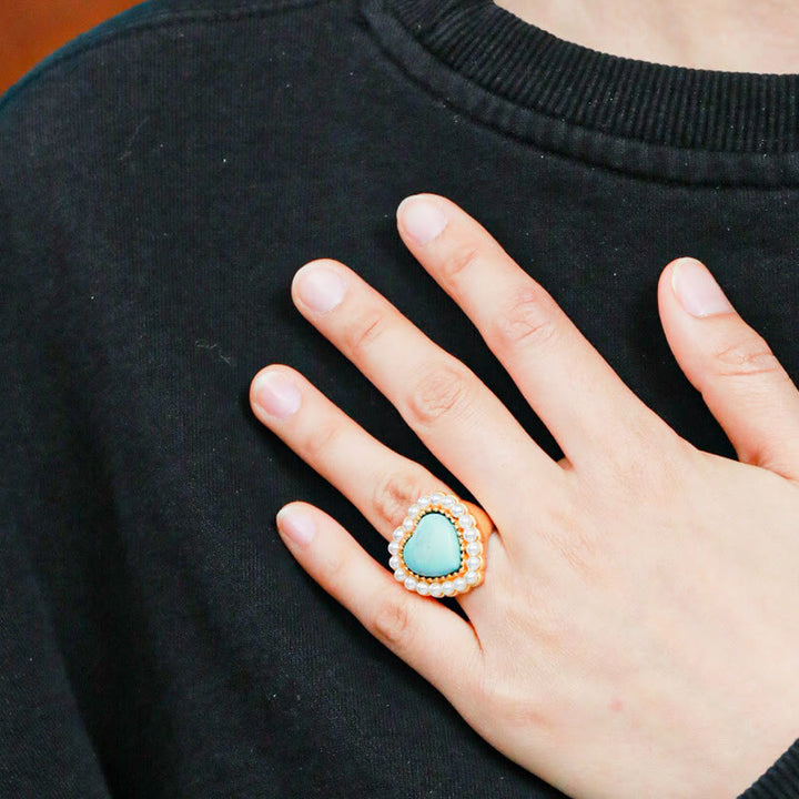 Anillo ajustable en forma de corazón con perla turquesa de Olivenorma 