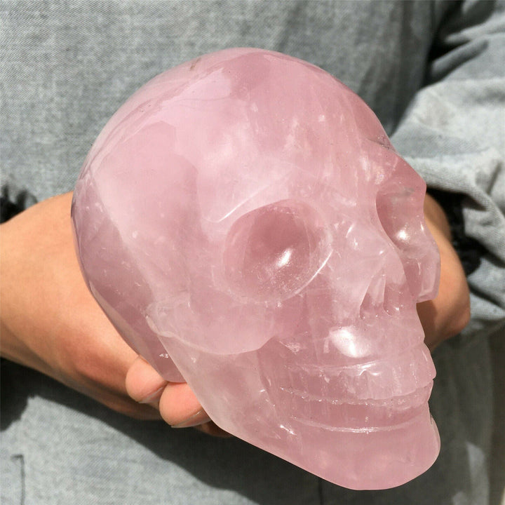 Decoración de calavera de cristal de cuarzo rosa natural de Olivenorma
