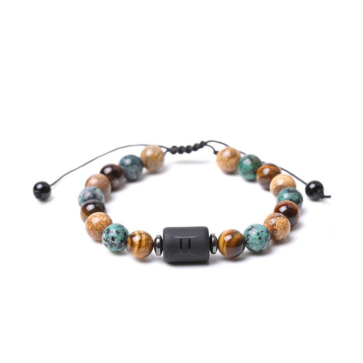 Pulsera con imagen de ojo de tigre y jaspe del zodiaco