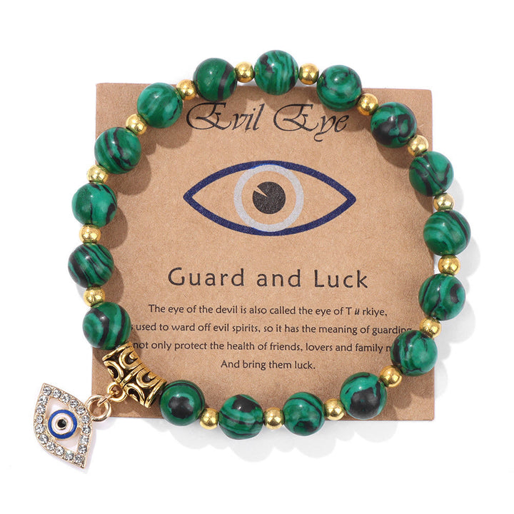 Pulsera con colgante de ojo malvado y cuentas de piedra natural de Olivenorma
