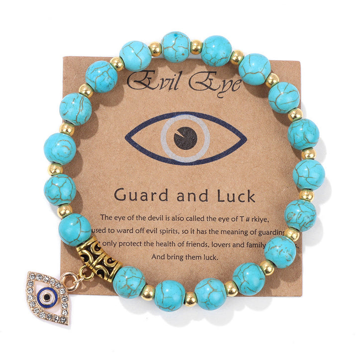 Pulsera con colgante de ojo malvado y cuentas de piedra natural de Olivenorma
