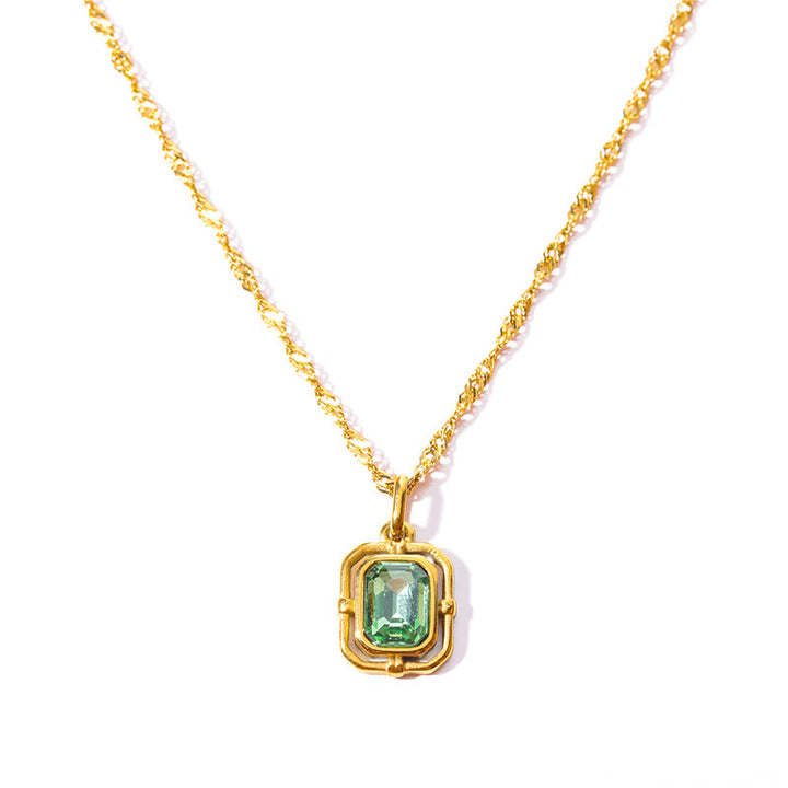 Collar de acero y titanio con circonitas cuadradas y cadena de ondas de agua de Olivenorma 