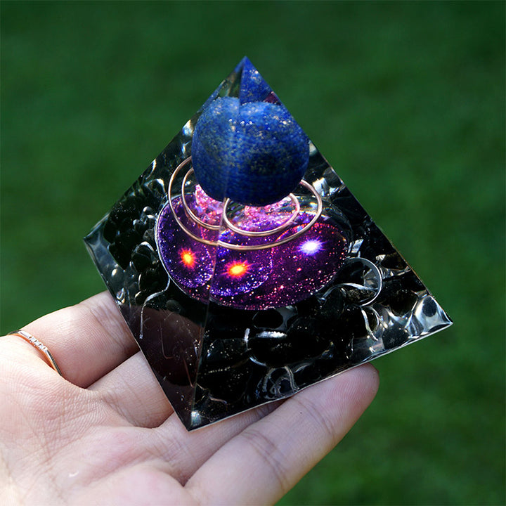 Esfera de lapislázuli de Olivenorma con pirámide de orgón de obsidiana