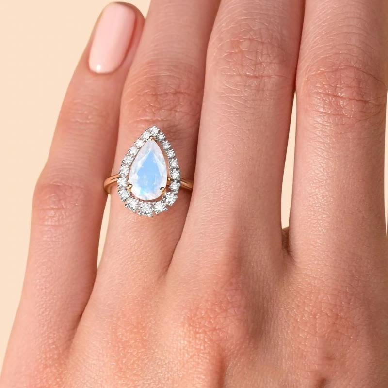 Anillo de oro rosa S925 con circonita blanca y piedra lunar en forma de gota de agua de Olivenorma