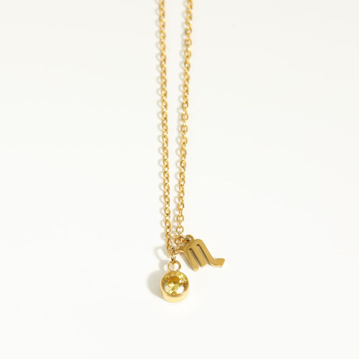 Collar de acero inoxidable con piedra natal y runa del zodíaco de Olivenorma
