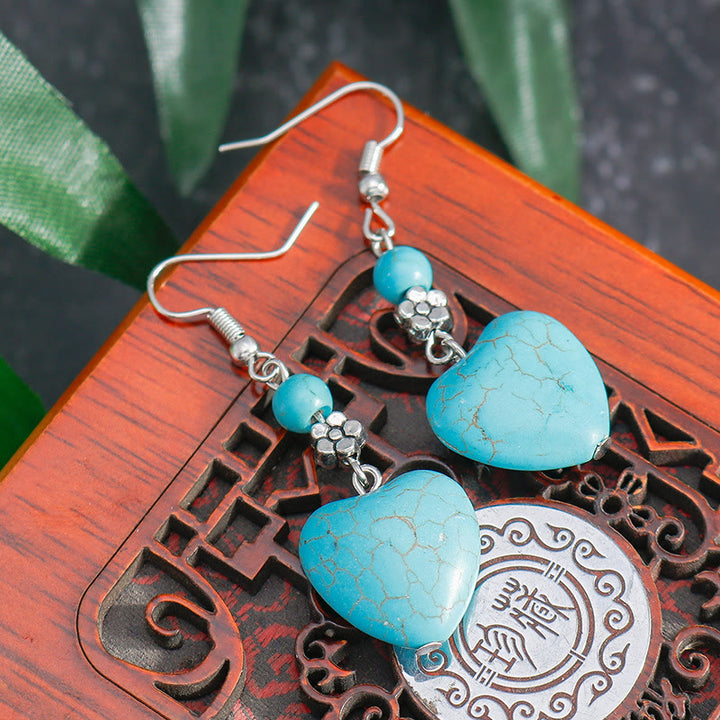 Pendientes colgantes con forma de corazón de turquesa de Olivenorma