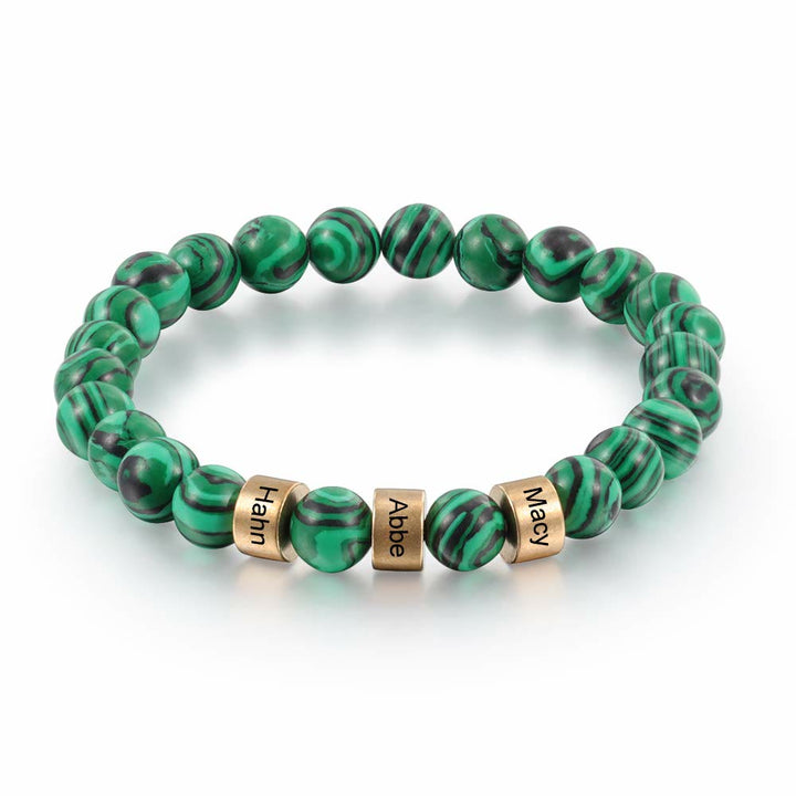 Pulsera de hombre personalizada con cuentas grabadas en piedra natural de Olivenorma
