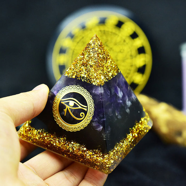 Pirámide de orgón con símbolo del ojo de Horus, amatista y obsidiana de Olivenorma 