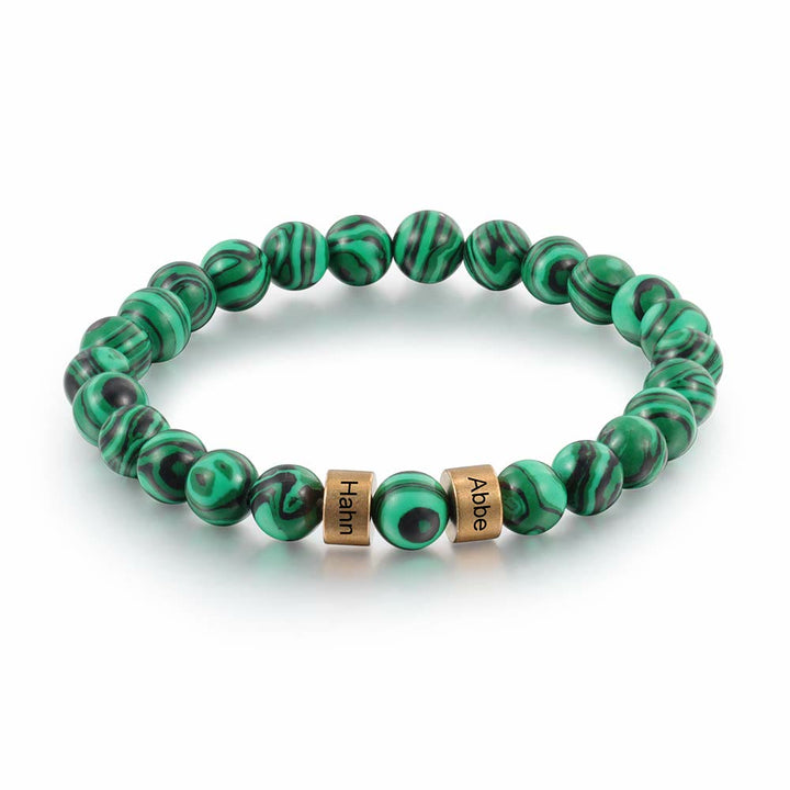 Pulsera de hombre personalizada con cuentas grabadas en piedra natural de Olivenorma