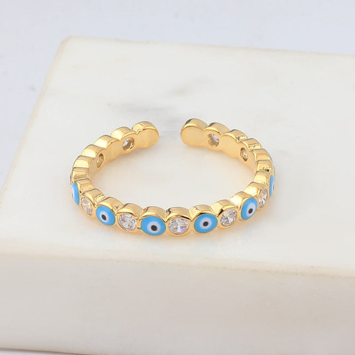 Anillo ajustable con circonita blanca y ojo malvado de colores de Olivenorma 