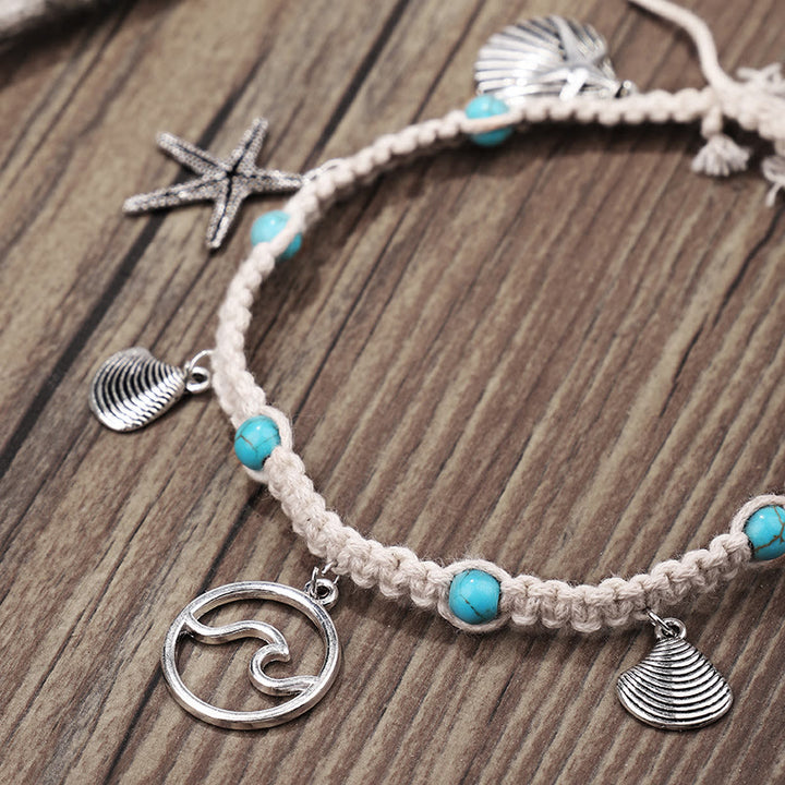 Pulsera tobillera con dije de estrella de mar turquesa y olas de Olivenorma
