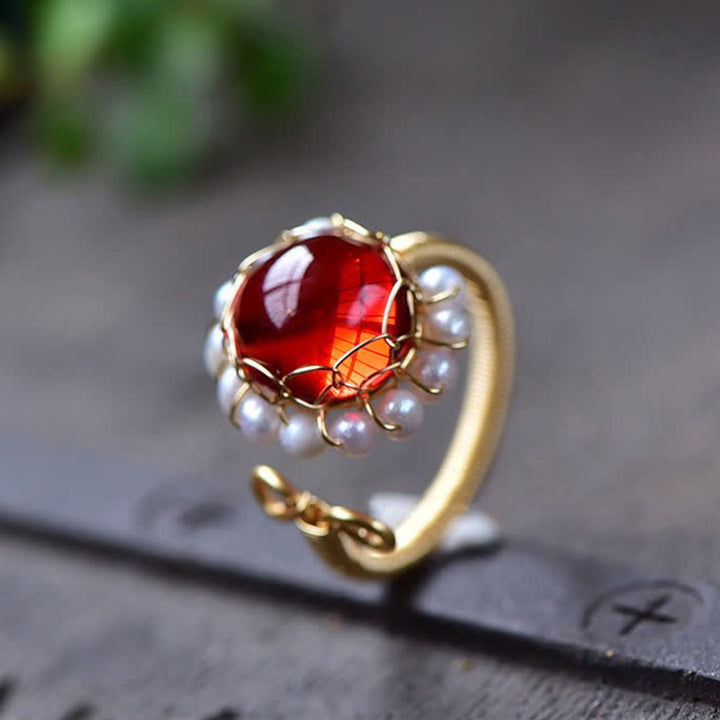 Anillo curativo de cuarzo rojo con perla