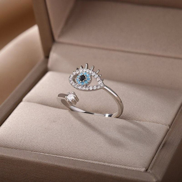 Anillo ajustable con diamantes y ojo malvado de Olivenorma