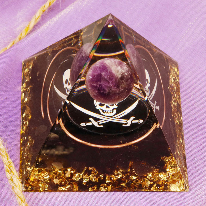 Pirámide de orgón con símbolo de calavera de amatista y obsidiana de Olivenorma