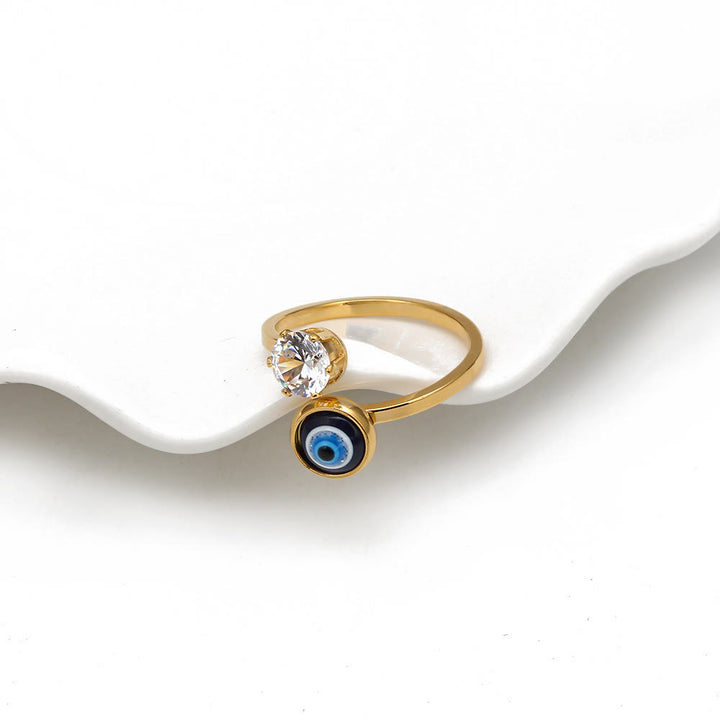 Anillo de mujer con ojo malvado bañado en oro y circonita blanca de Olivenorma 
