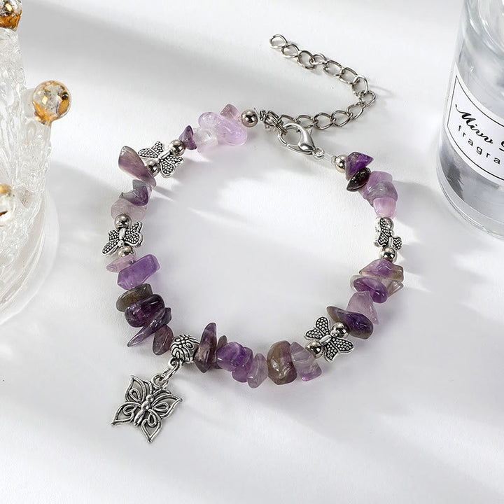 Pulsera con dije de mariposa de escombros de cristal colorido de Olivenorma
