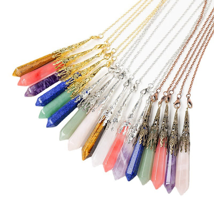 Péndulo de cadena de cobre y plata dorada con cristal natural de Olivenorma 