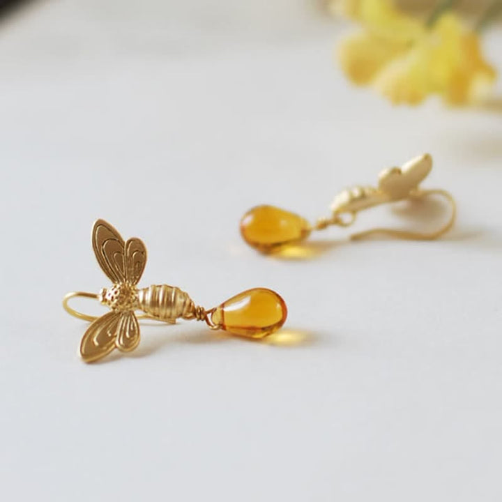 Pendientes y collar con gotas de miel de topacio y ámbar de Olivenorma