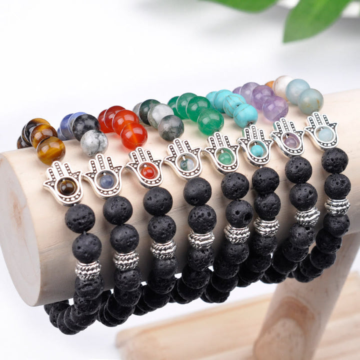 Pulsera con colgante de Hamsa y cuentas de piedra natural hecha a mano de Olivenorma