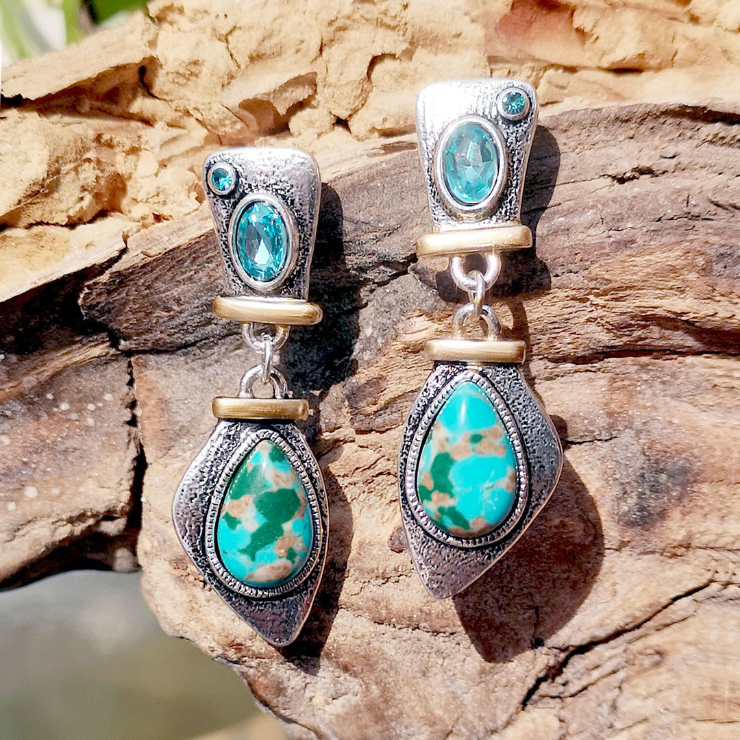 Pendientes de plata con topacio azul y piedra emperadora de Olivenorma