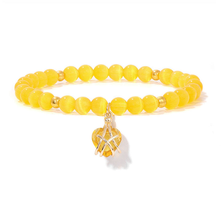 Pulsera con dije de corazón de piedra natural de Olivenorma