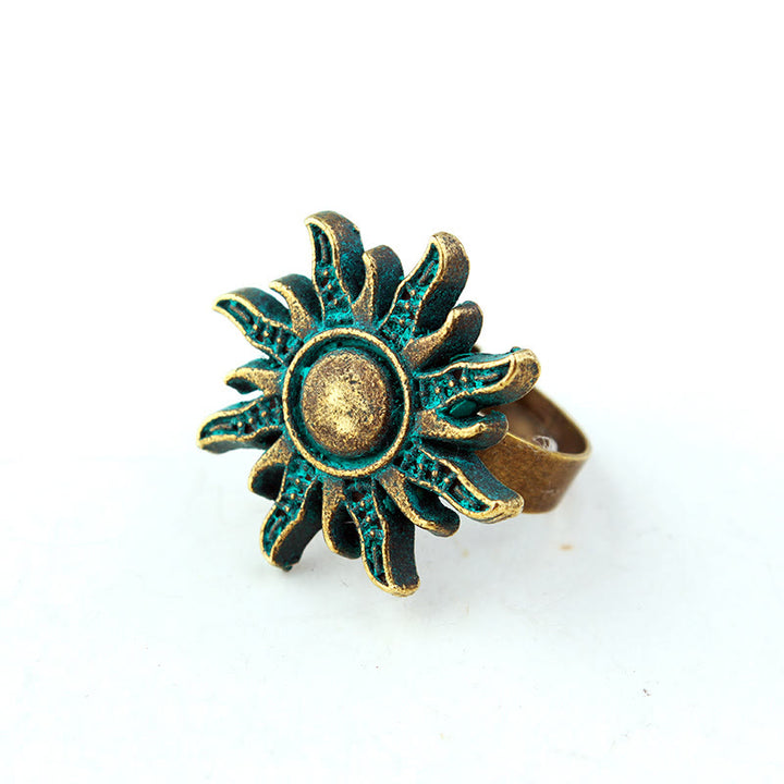 Anillo de bronce exótico gótico con sol verde oscuro de Olivenorma 
