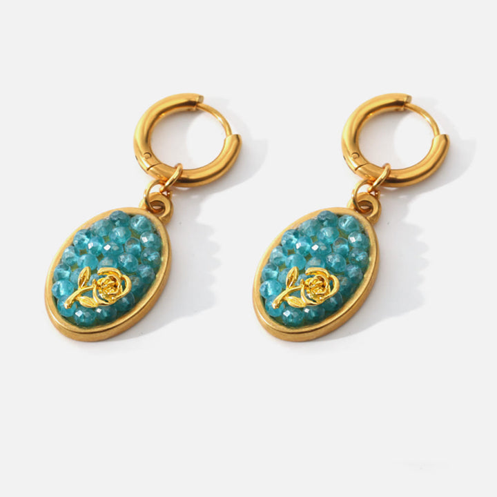 Pendientes colgantes ovalados con turmalina Paraiba y rosa triturada de Olivenorma