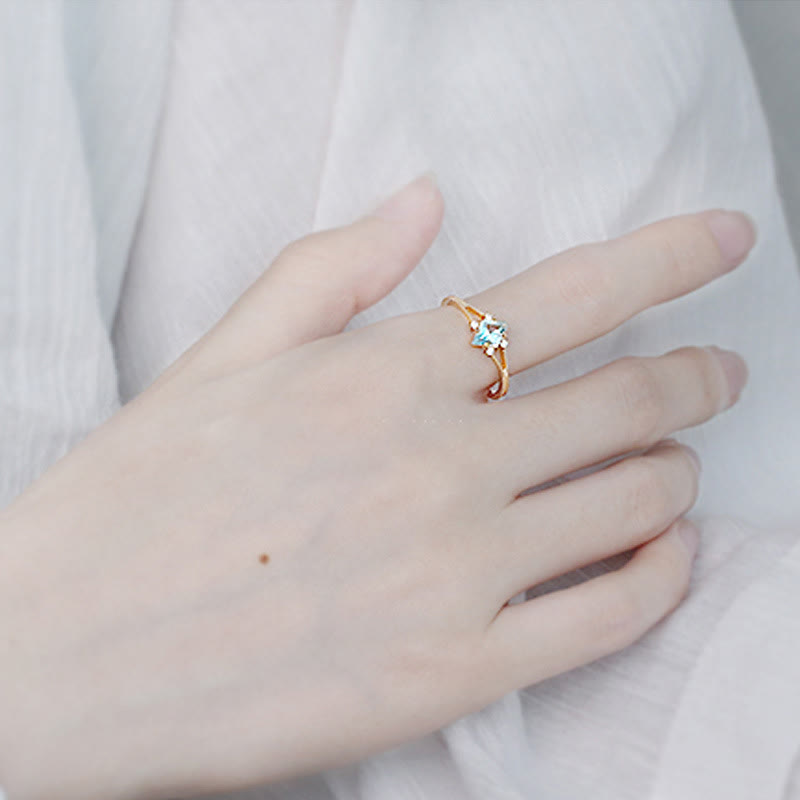 Anillo de diamantes y circonitas blancas con aguamarina de Olivenorma