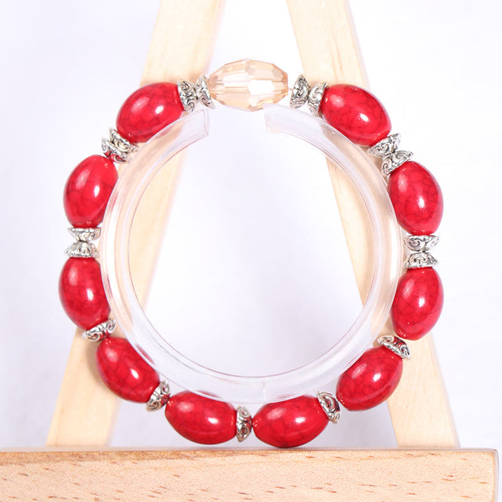 Juego de pulseras con cuentas y colgante de corazón con alas de elefante de Olivenorma 