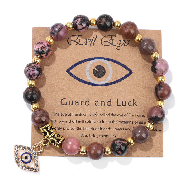 Pulsera con colgante de ojo malvado y cuentas de piedra natural de Olivenorma