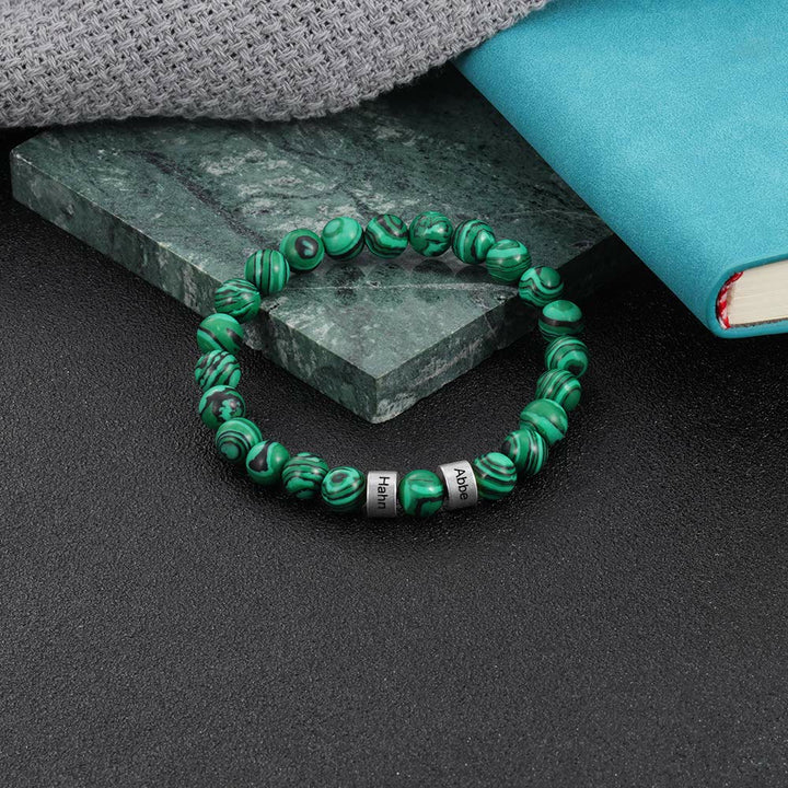 Pulsera de hombre personalizada con cuentas grabadas en piedra natural de Olivenorma