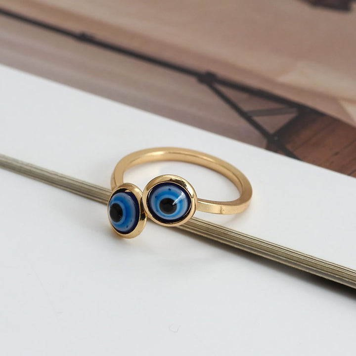 Anillo de mujer con ojo malvado bañado en oro y circonita blanca de Olivenorma 