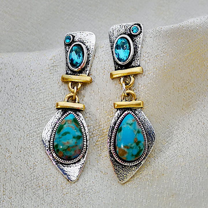Pendientes de plata con topacio azul y piedra emperadora de Olivenorma