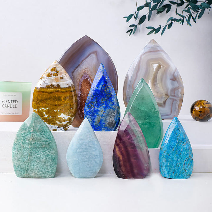 Adornos de piedras preciosas con forma de llama de cristal natural de Olivenorma
