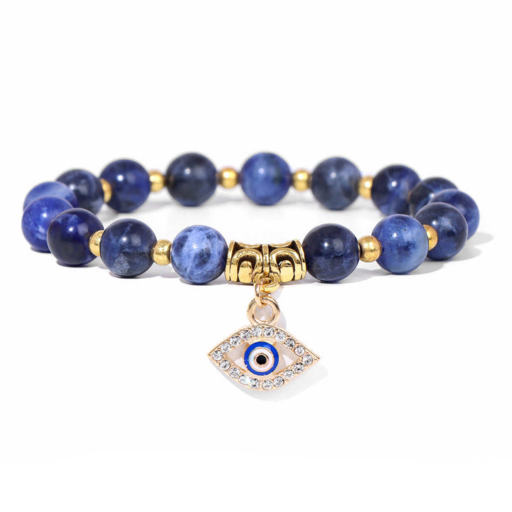 Pulsera con colgante de ojo malvado y cuentas de piedra natural de Olivenorma