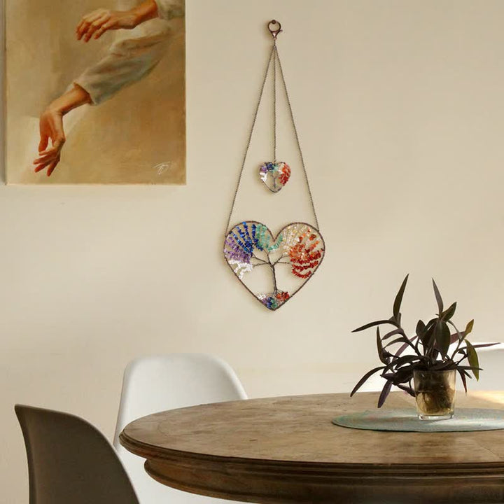 Atrapasueños de cristal con forma de corazón y árbol de la vida de los chakras de Olivenorma. 