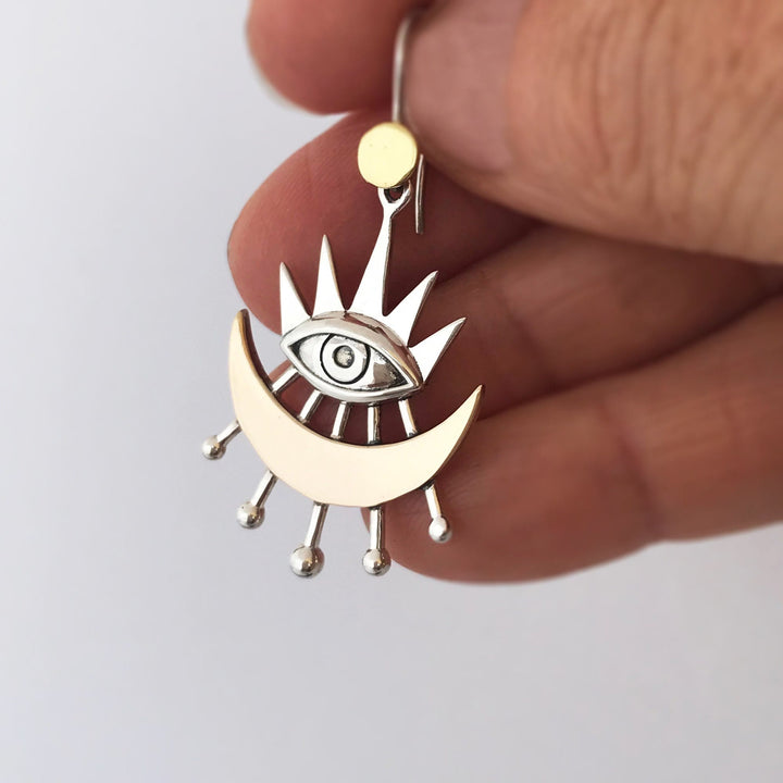 Pendientes de ojo malvado con rayos de luna creciente de Olivenorma