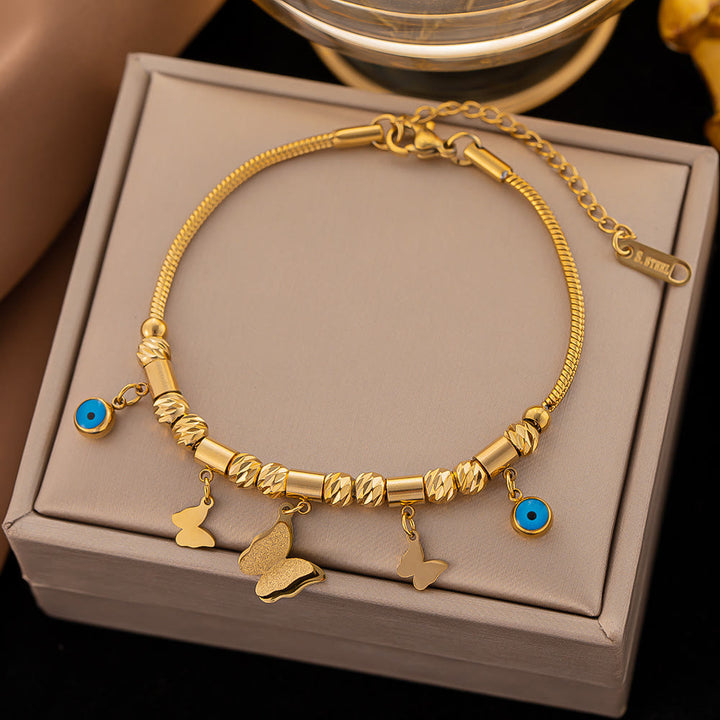 Pulsera envolvente con ojo malvado de turquesa dorada de Olivenorma
